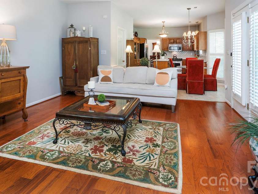 4314 Silvermere Way, Charlotte, NC 28269.  MLS# CAR4417932, YatesRealty ID 47777. Family room looking into kitchen