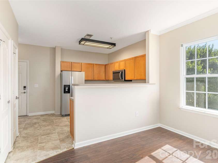 331 Appeldoorn Circle, Asheville, NC 28803.  MLS# CAR4418099, YatesRealty ID 47778. Dining and kitchen.
