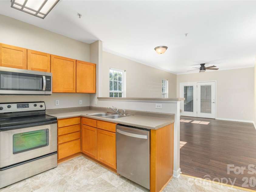 331 Appeldoorn Circle, Asheville, NC 28803.  MLS# CAR4418099, YatesRealty ID 47778. Kitchen with updated flooring!