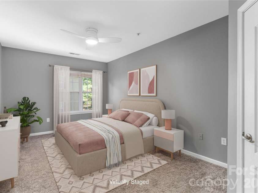 331 Appeldoorn Circle, Asheville, NC 28803.  MLS# CAR4418099, YatesRealty ID 47778. Large primary bedroom. Virtually staged and virtually painted.