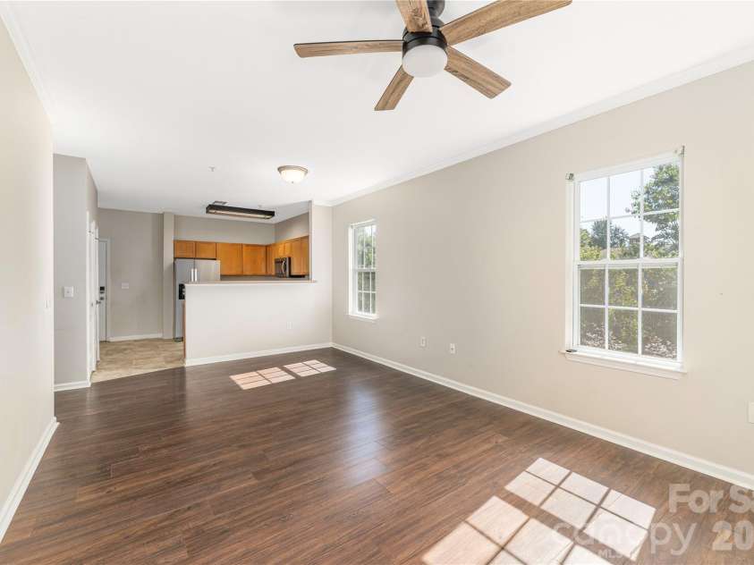 331 Appeldoorn Circle, Asheville, NC 28803.  MLS# CAR4418099, YatesRealty ID 47778. Open living dining kitchen space.