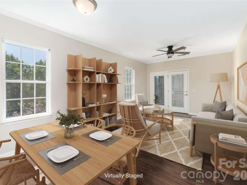 331 Appeldoorn Circle, Asheville, NC 28803.  MLS# CAR4418099, YatesRealty ID 47778. Open living dining space, with doors out to the covered back deck. Virtually Staged.