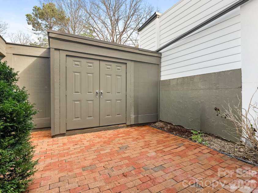 3760 Winding Creek Lane, Charlotte, NC 28226.  MLS# CAR4354381, YatesRealty ID 4778. Courtyard / Storage Room