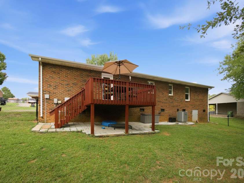 105 Ashburne Drive, Shelby, NC 28152.  MLS# CAR4419130, YatesRealty ID 47781. Deck overlooks the fenced in backyard