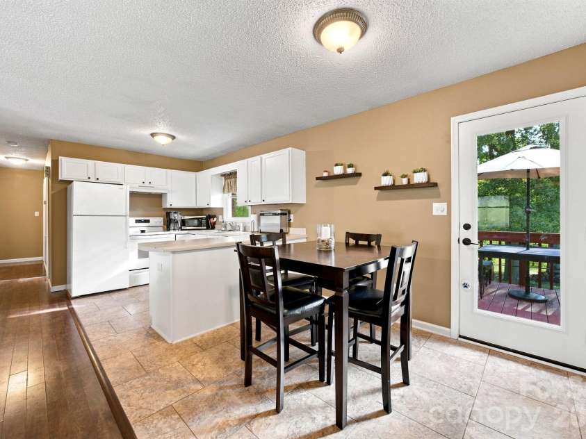 105 Ashburne Drive, Shelby, NC 28152.  MLS# CAR4419130, YatesRealty ID 47781. Dining room opens up onto the back deck