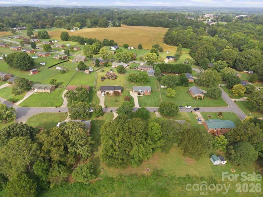105 Ashburne Drive, Shelby, NC 28152.  MLS# CAR4419130, YatesRealty ID 47781. Mature trees surrounding this home