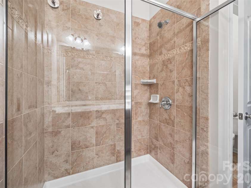 706 Deerbrook Lane, Tega Cay, SC 29708.  MLS# CAR4418355, YatesRealty ID 47783. Primary shower