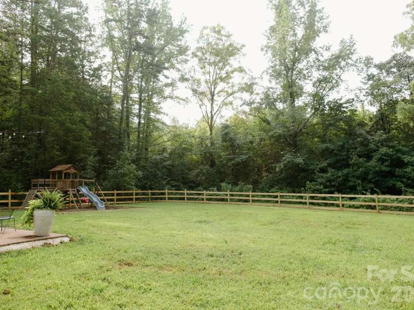 2100 Little Gold Road, Concord, NC 28025.  MLS# CAR4419524, YatesRealty ID 47786. Back yard
