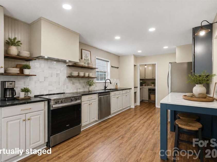 2648 Stream Bank Drive, Charlotte, NC 28269.  MLS# CAR4419146, YatesRealty ID 47791. 