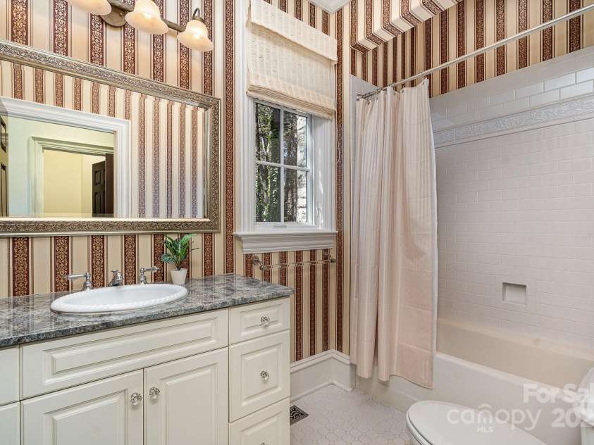 20711 Bethel Church Road, Cornelius, NC 28031.  MLS# CAR4225782, YatesRealty ID 478. 1st floor bath