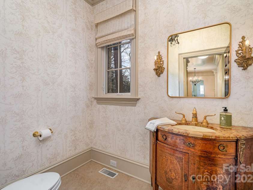 20711 Bethel Church Road, Cornelius, NC 28031.  MLS# CAR4225782, YatesRealty ID 478. Formal powder room