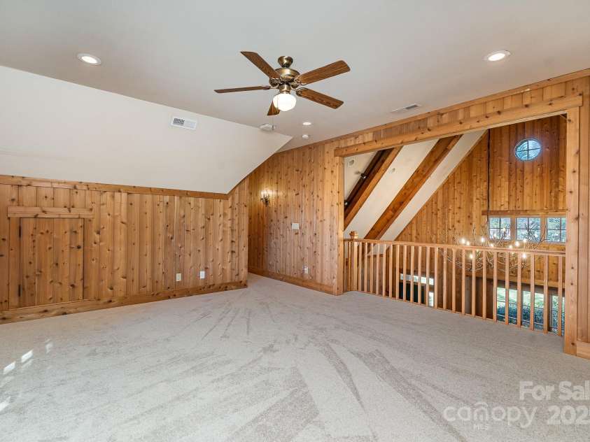 20711 Bethel Church Road, Cornelius, NC 28031.  MLS# CAR4225782, YatesRealty ID 478. Guest house upper loft and 1/2 bath