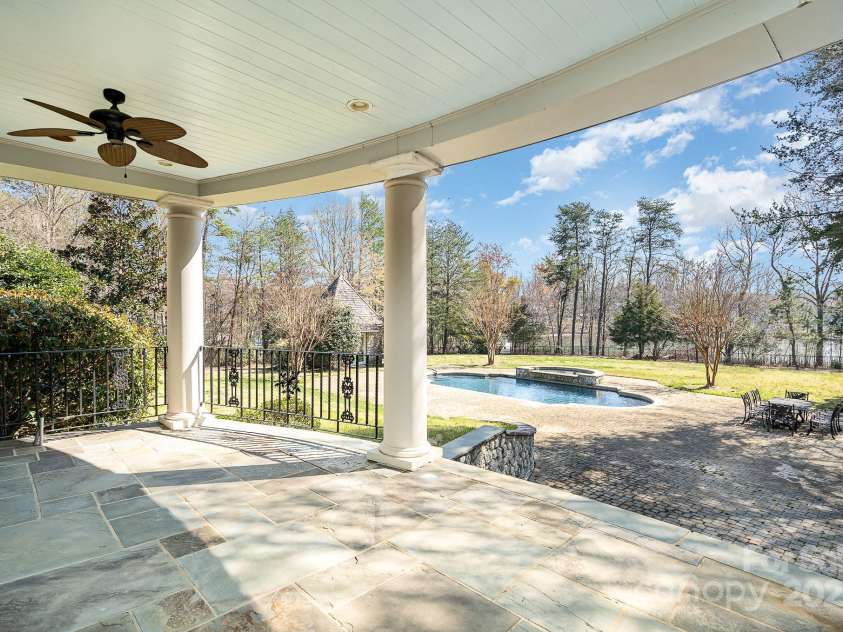 20711 Bethel Church Road, Cornelius, NC 28031.  MLS# CAR4225782, YatesRealty ID 478. Stone covered patio