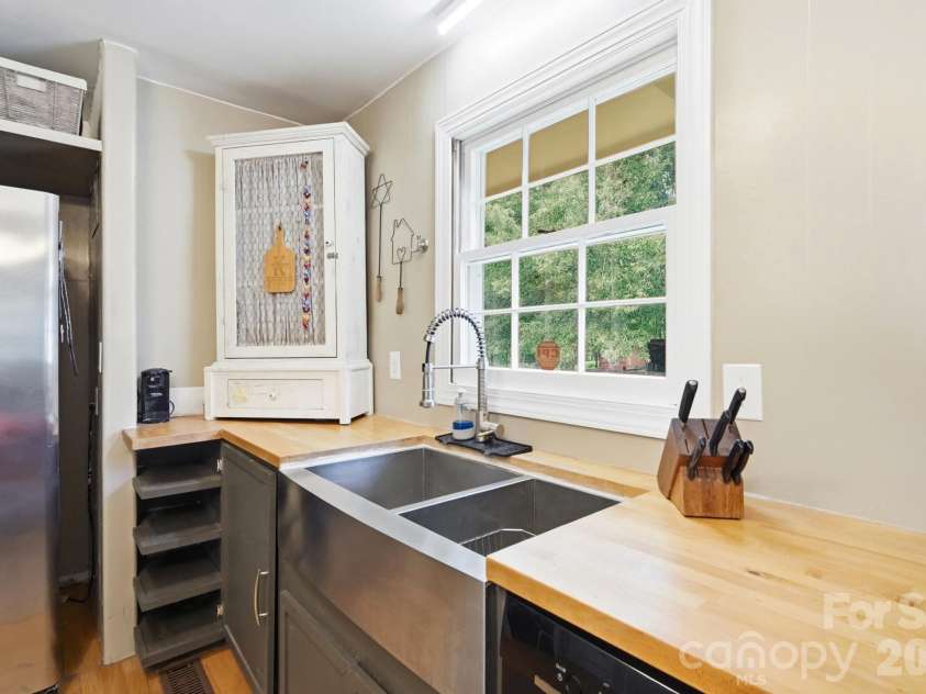 205 Airport Road, Wesley Chapel, NC 28110.  MLS# CAR4418065, YatesRealty ID 47810. Apron front sink