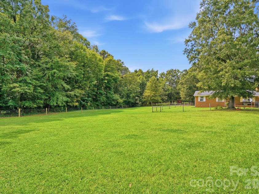 205 Airport Road, Wesley Chapel, NC 28110.  MLS# CAR4418065, YatesRealty ID 47810. Front pasture