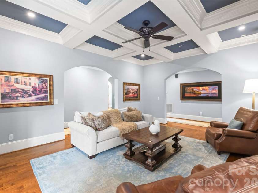 7320 Summerlin Place, Charlotte, NC 28226.  MLS# CAR4418024, YatesRealty ID 47825. Architectural archways frame the layout with elegance, creating a seamless and sophisticated transition between living spaces.