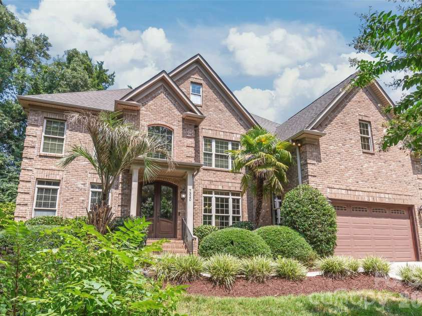 7320 Summerlin Place, Charlotte, NC 28226.  MLS# CAR4418024, YatesRealty ID 47825. This Persis Nova full brick custom home combines timeless architecture with uncompromising quality in prime South Charlotte.