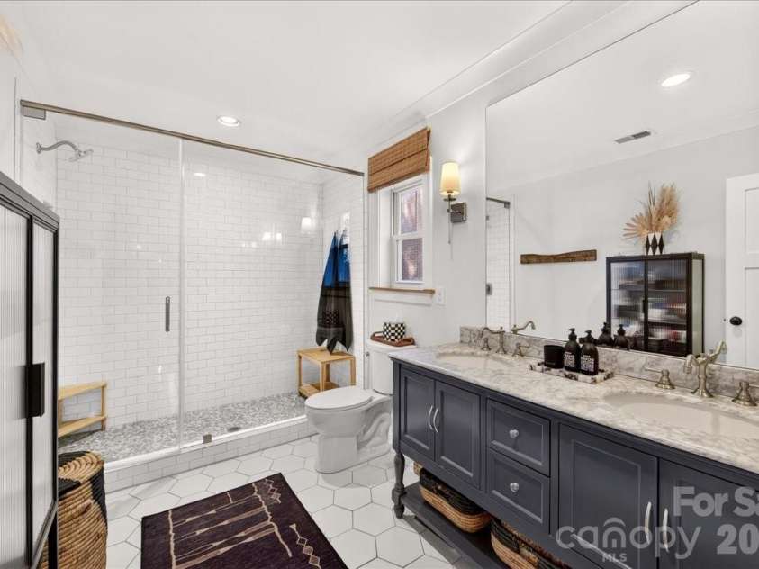 3020 Holt Street, Charlotte, NC 28205.  MLS# CAR4414227, YatesRealty ID 47834. Primary ensuite bath