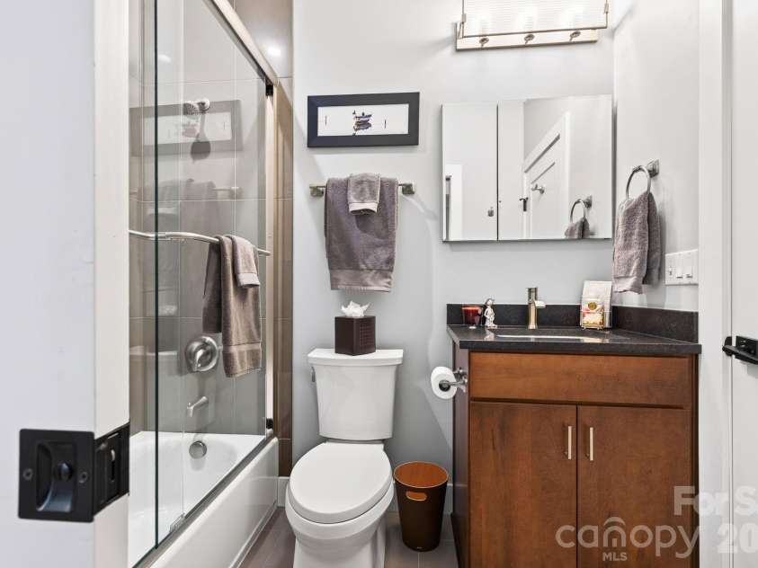 16 Britton Knoll Pass, Arden, NC 28704.  MLS# CAR4417470, YatesRealty ID 47841. Guest Bathroom
