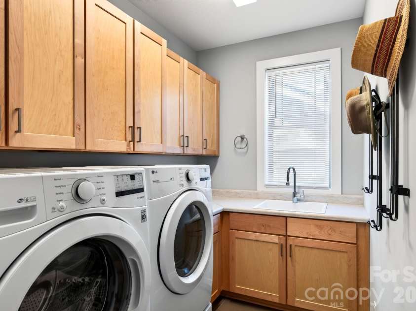 16 Britton Knoll Pass, Arden, NC 28704.  MLS# CAR4417470, YatesRealty ID 47841. Laundary Room