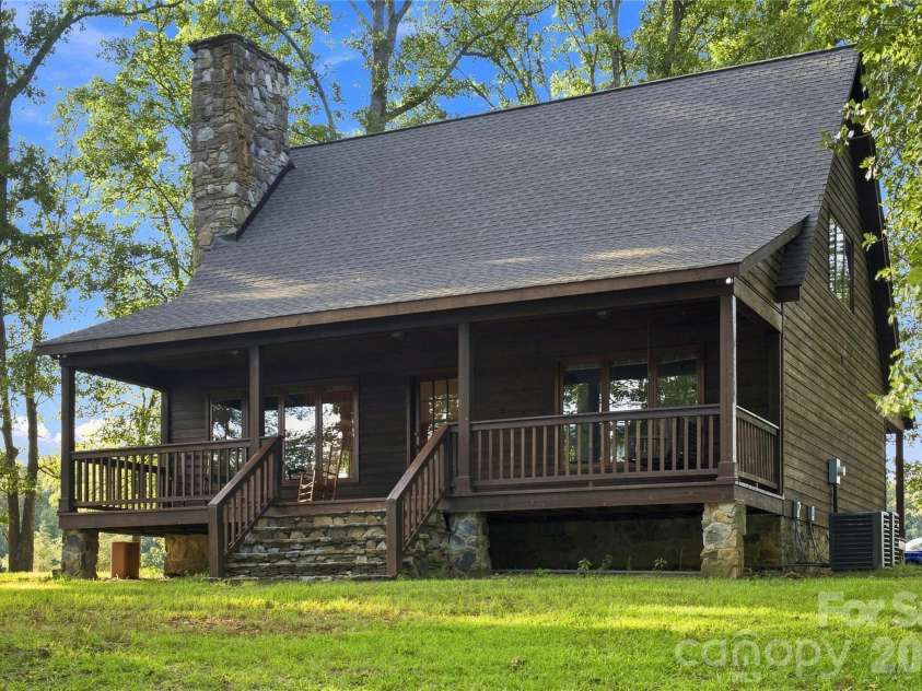 1979 Willie Usher Road, Lancaster, SC 29720.  MLS# CAR4410738, YatesRealty ID 47845. Covered porch overlooking pond