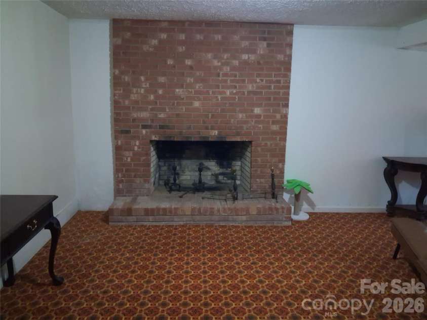 114 Ashworth Circle, Marion, NC 28752.  MLS# CAR4419710, YatesRealty ID 47852. Fireplace in basement
