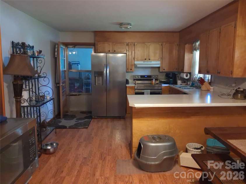 114 Ashworth Circle, Marion, NC 28752.  MLS# CAR4419710, YatesRealty ID 47852. Kitchen with newer stainless steel appliances