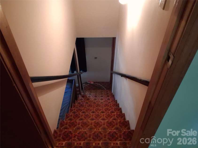 114 Ashworth Circle, Marion, NC 28752.  MLS# CAR4419710, YatesRealty ID 47852. Steps to basement/bonus area