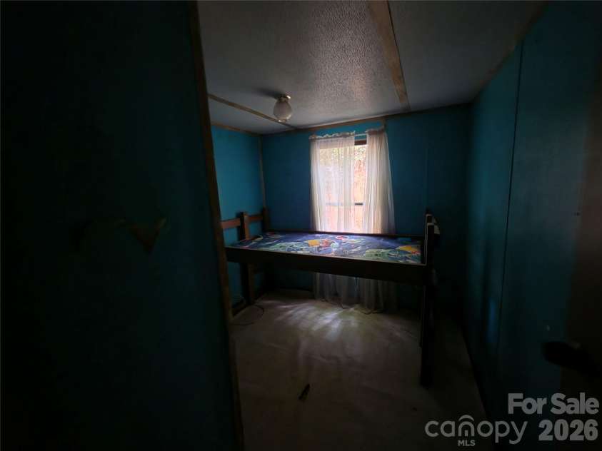 40 Gunches Dirt Road, Candler, NC 28715.  MLS# CAR4419713, YatesRealty ID 47858. 
