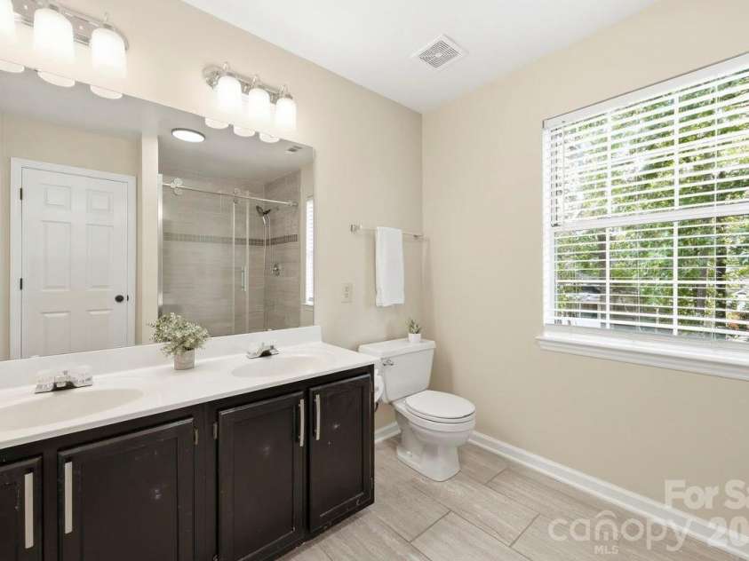 14230 Quartz Lane, Pineville, NC 28134.  MLS# CAR4419723, YatesRealty ID 47864. DOUBLE VANITY PRIMARY ENSUITE