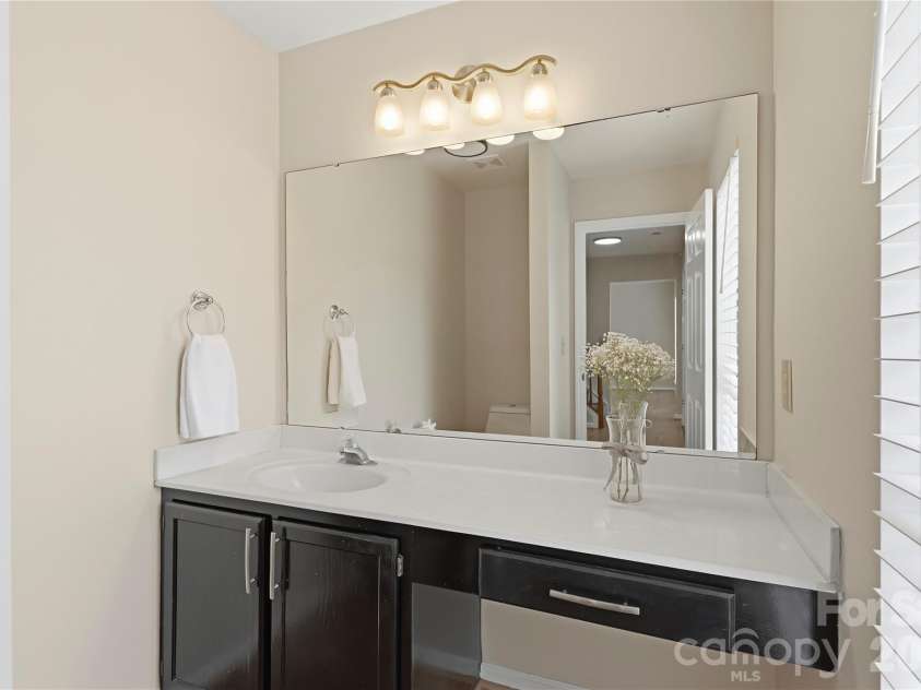 14230 Quartz Lane, Pineville, NC 28134.  MLS# CAR4419723, YatesRealty ID 47864. POWDER BATH ON MAIN LEVEL