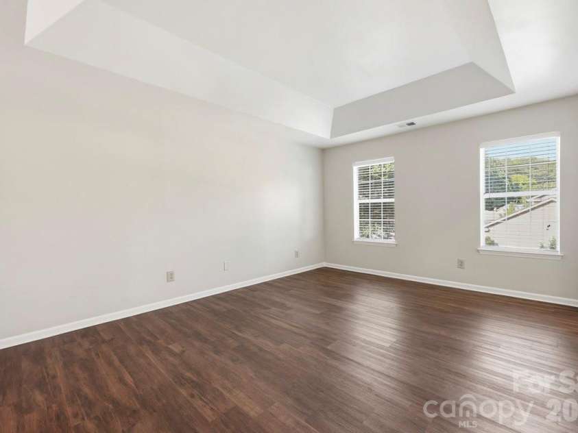 14230 Quartz Lane, Pineville, NC 28134.  MLS# CAR4419723, YatesRealty ID 47864. TRAY CEILING PRIMARY BEDROOM