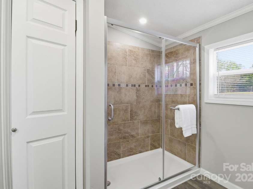 2501 Swanson Road, Crouse, NC 28033.  MLS# CAR4332469, YatesRealty ID 4787. Primary Bathroom shower