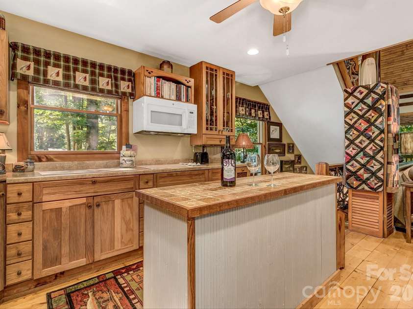 779 Thissa Way, Brevard, NC 28712.  MLS# CAR4416210, YatesRealty ID 47872. 