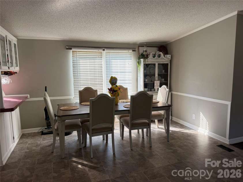 26434 Wayne Drive, Albemarle, NC 28001.  MLS# CAR4418194, YatesRealty ID 47873. Dining Room