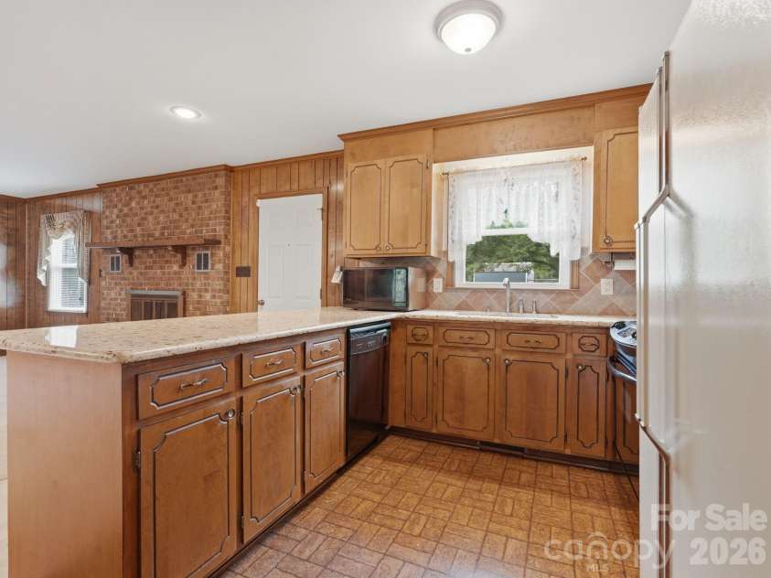 1807 Alamance Drive, Concord, NC 28027.  MLS# CAR4418991, YatesRealty ID 47875. 