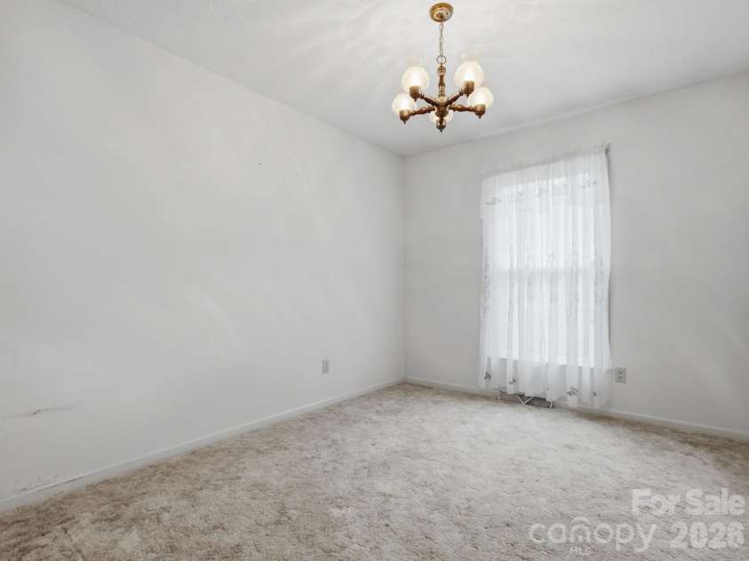 1807 Alamance Drive, Concord, NC 28027.  MLS# CAR4418991, YatesRealty ID 47875. 