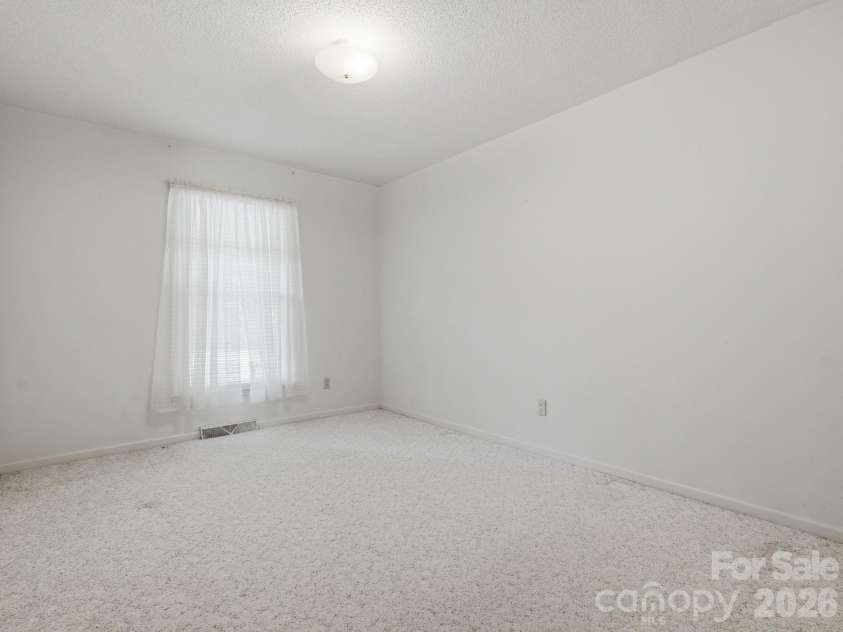 1807 Alamance Drive, Concord, NC 28027.  MLS# CAR4418991, YatesRealty ID 47875. 