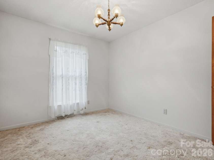 1807 Alamance Drive, Concord, NC 28027.  MLS# CAR4418991, YatesRealty ID 47875. 