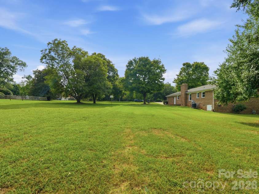 1807 Alamance Drive, Concord, NC 28027.  MLS# CAR4418991, YatesRealty ID 47875. 