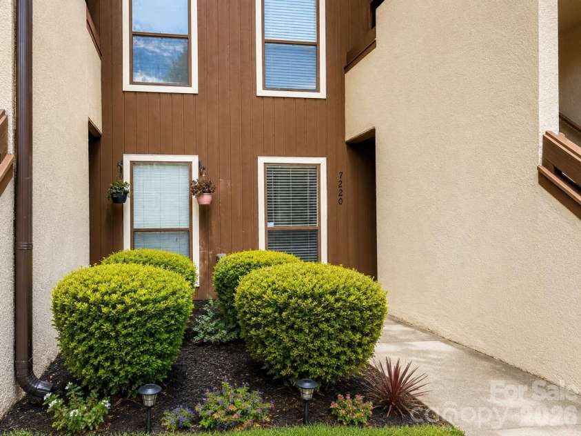 7220 Winery Lane, Charlotte, NC 28227.  MLS# CAR4418792, YatesRealty ID 47876. Sidewalk to the Condo