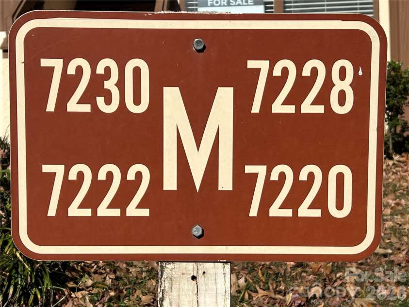 7220 Winery Lane, Charlotte, NC 28227.  MLS# CAR4418792, YatesRealty ID 47876. The Building Sign