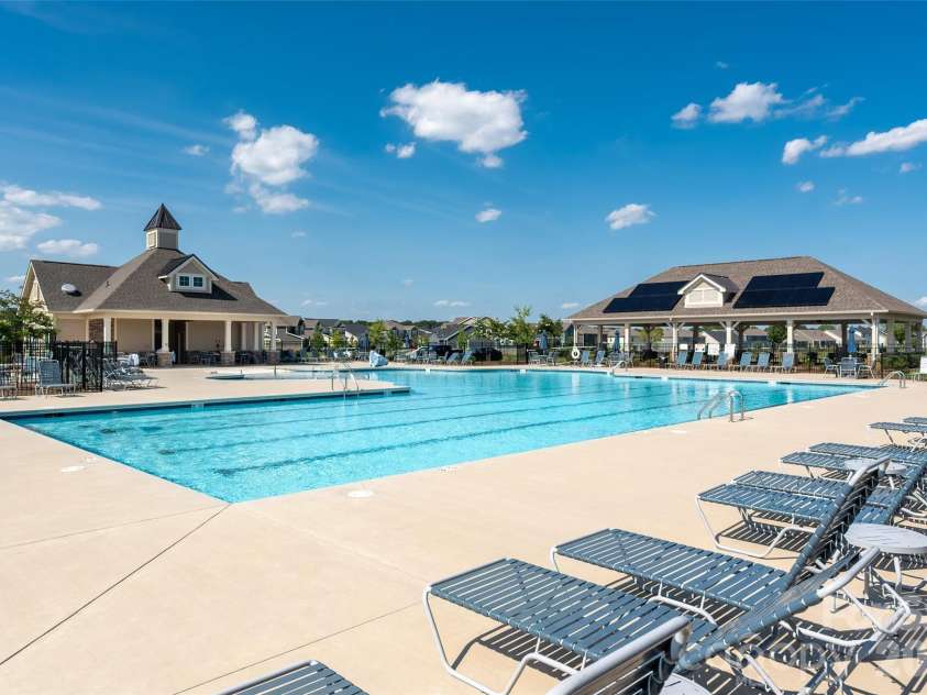 2538 Crimson Way, Monroe, NC 28112.  MLS# CAR4418315, YatesRealty ID 47877. Community pool offers plenty of seating