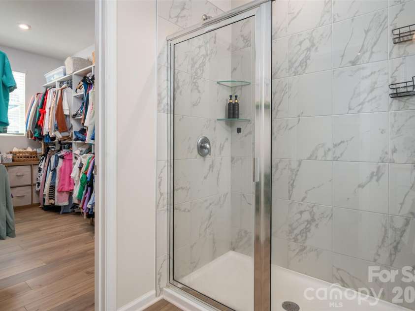 2538 Crimson Way, Monroe, NC 28112.  MLS# CAR4418315, YatesRealty ID 47877. Other features include large tiled shower and walk in closet with custom shelving