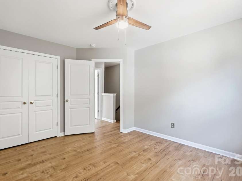 11402 Heritage Green Drive, Cornelius, NC 28031.  MLS# CAR4413381, YatesRealty ID 47889. Custom closet system in Guest room #2