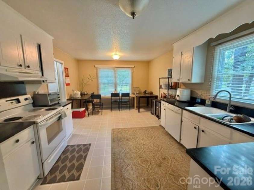 5701 Trotters Ridge Road, Charlotte, NC 28227.  MLS# CAR4419787, YatesRealty ID 47898. Kitchen from backdoor