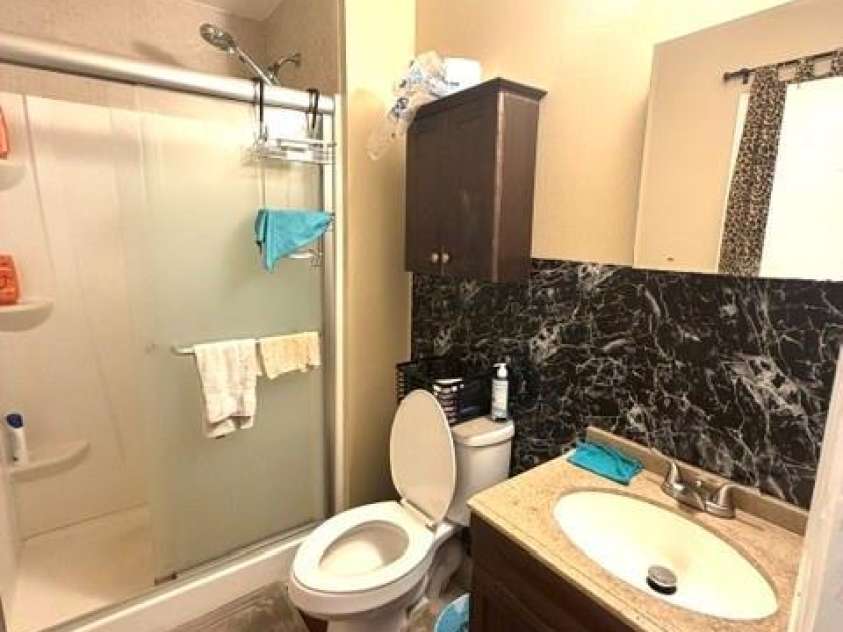 5701 Trotters Ridge Road, Charlotte, NC 28227.  MLS# CAR4419787, YatesRealty ID 47898. Main bathroom