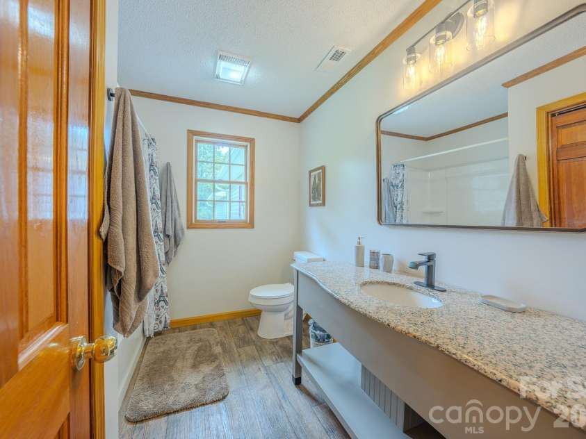 163 Meadowbrook Lane, Marion, NC 28752.  MLS# CAR4417340, YatesRealty ID 47903. Guest bathroom