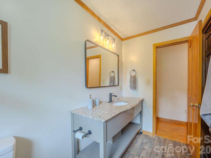 163 Meadowbrook Lane, Marion, NC 28752.  MLS# CAR4417340, YatesRealty ID 47903. Guest Bathroom