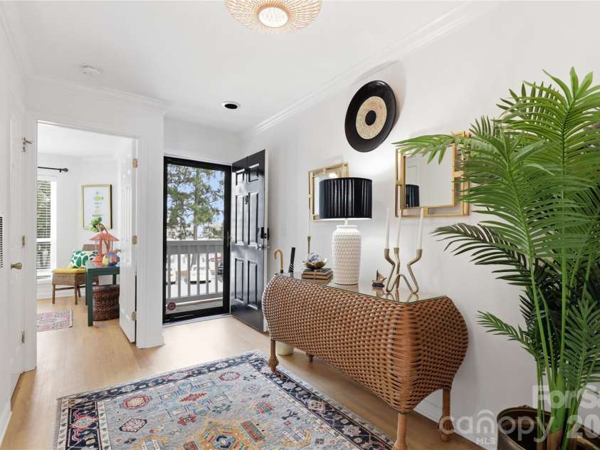 932 Southwest Drive, Davidson, NC 28036.  MLS# CAR4414444, YatesRealty ID 47906. Open connection between the living and dining areas.